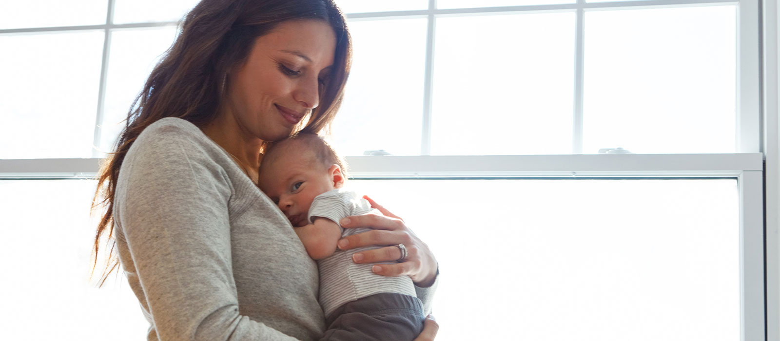 mother with baby on her chest